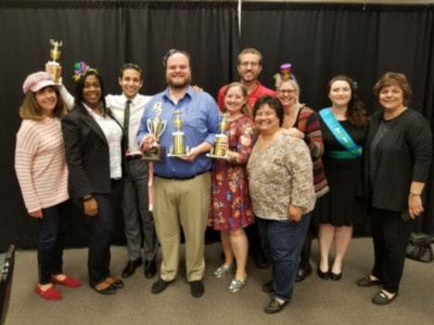 From left to right: S. Kinsella, M. Walker-Pickett, F. Orlando (standing in back), S. Okey, C. Kozina, R. Murphy (standing in back), C. Lee, R. Waddell, J. Miller (wearing sash), and M. Spoto.